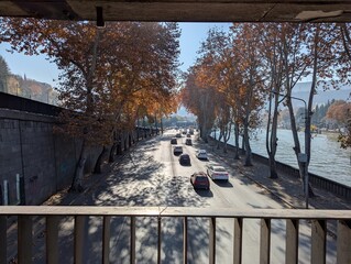 Aerial view from the bridge over the Mtkvari River in Tbilisi on a sunny autumn day.



