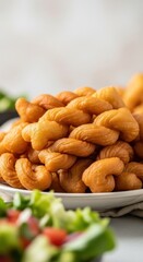 Fototapeta premium Golden Twisted Fried Moroccan Pastries on a White Plate