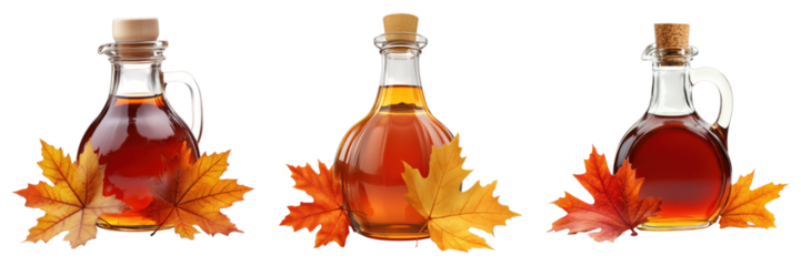 Three glass bottles filled with maple syrup alongside autumn leaves, showcasing a natural theme