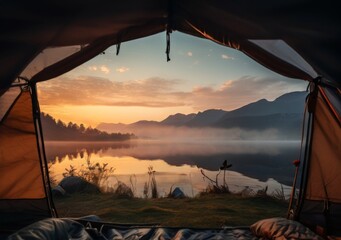Camping Tent View of Lake and Mountains in Sunrise. Tent interior frames a serene sunrise over misty lake. Natures calm with mist and mountains. Soft lighting enhances peaceful lake view from tent