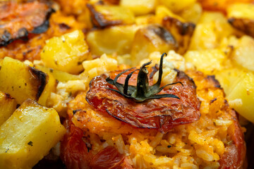 Rice-stuffed Tomatoes with Potatoes