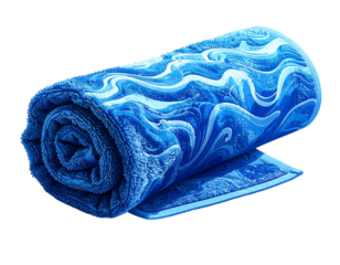 Neatly Rolled Blue Towel with Wave Patterns on Beach