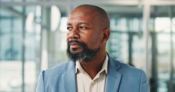 Business, management and thinking with black man in office for decision, planning or vision. Corporate, experience and ideas with mature African manager in professional workplace for development