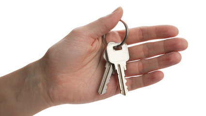 hand holding silver keys, symbolizing home and security . Isolated on transparent background, png