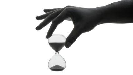 hand holding hourglass, time ticking by in grayscale picture . Isolated on transparent background, png