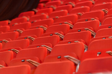 Obraz premium Rows of seats arranged inside a venue, prepared for attendees before the event begins