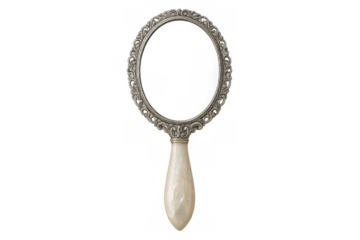 Vintage hand mirror with ornate silver frame and mother of pearl handle showing elegance and classic beauty
