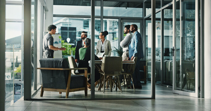 Collaboration, meeting and presentation with business people in boardroom for coaching or training. Data, feedback and whiteboard with employee group in glass office for review of charts or graphs