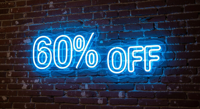 Stunning neon sign flashes 60% OFF in vibrant blue, grabbing attention for massive sales and promotions against a rustic brick wall backdrop