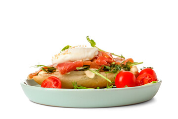 Plate with tasty egg Benedict isolated on white background