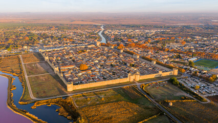 Aerial view of the medieval city of Aigues-Mortes at sunrise, in the Gard department, Occitanie region, France