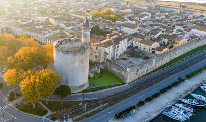 The Constance Tower of the medieval city of Aigues-Mortes at sunrise, in the Gard department, Occitanie region, France