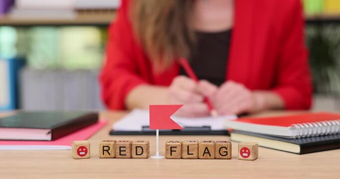 Discovering the meaning behind red flags in relationships and personal growth at a cozy desk setting