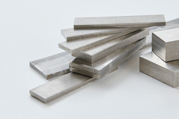 Close up image of metallic surface sheets with brushed and matte finishes, showcasing industrial texture and modern material design for architecture, manufacturing, and product design applications.