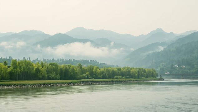 Misty mountain landscape, serene river, lush trees, distant bridge. - Powered by Adobe