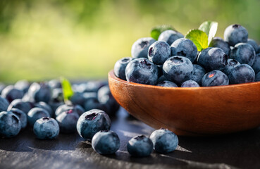 Blueberry antioxidant organic superfood in a wooden bowl