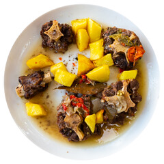 Cordovan-style oxtail with boiled potatoes. Isolated over white background