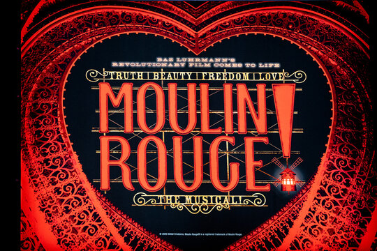 Moulin Rouge Cabaret Play Signage, Brand Name Sign, Piccadilly Theater Exterior Logo, London West End Theatre District, England, United Kingdom &mdash; 10 November 2025