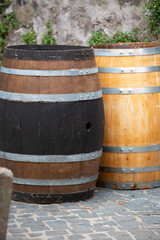 Fototapeta premium Vintage style brewery setup with herbs and aged barrels outdoors