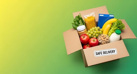 Cardboard box filled with fresh groceries and produce on a green background