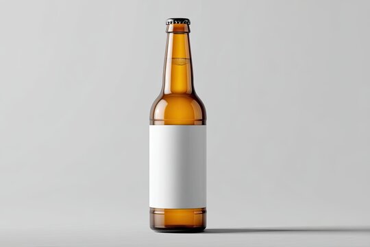 Amber beer bottle with blank label on plain background