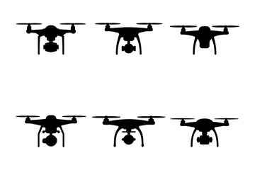 silhouette of drones in a row, demonstrating various functions