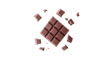 Fototapeta premium A visually appealing arrangement of dark chocolate squares with broken pieces scattered around. set against a clean white background. ideal for food photography or culinary use