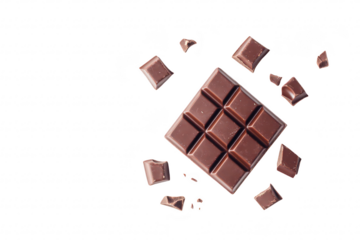 A visually appealing arrangement of dark chocolate squares with broken pieces scattered around. set against a clean white background. ideal for food photography or culinary use