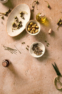 caper fruit and olives served as appetizer