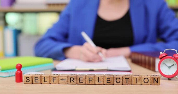 Engaging in self-reflection through writing in a colorful workspace during the afternoon hours
