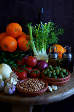Mediterranean diet, including traditional fresh fruit, vegetables, legumes, and herbs from the warm climate countries bordering the Mediterranean Sea with fresh, seasonal, and minimally processed food