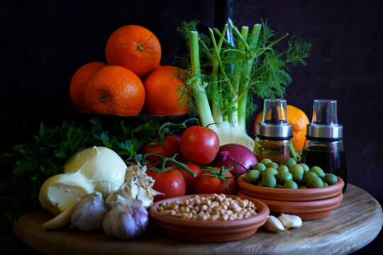 Mediterranean diet, including traditional fresh fruit, vegetables, legumes, and herbs from the warm climate countries bordering the Mediterranean Sea with fresh, seasonal, and minimally processed food