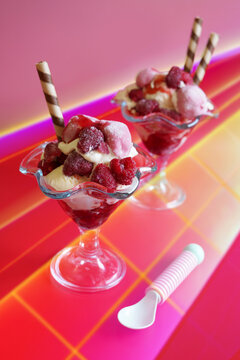 Retro Raspberry Ice Cream Sundae with Popular On-trend Neon Lights Aesthetic.