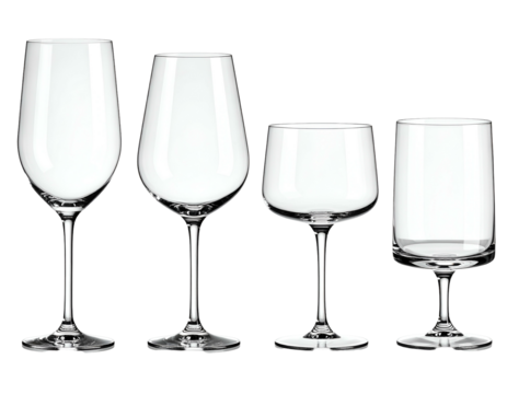Four crystal stemware glasses of differing shapes stand in a row, isolated