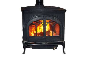 Warming fire in a rustic wood burning stove isolated on white or transparent background, png cut out