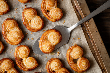 Freshly baked puff pastry palmiers.