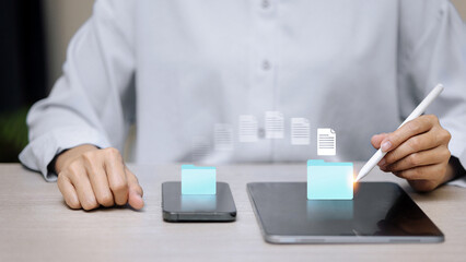 Businessman Using Tablet and Smartphone for Cloud Data Transfer and File Sharing