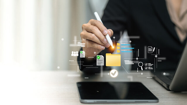 Businessman Using Digital Tablet for Cloud Data Management and Document Storage