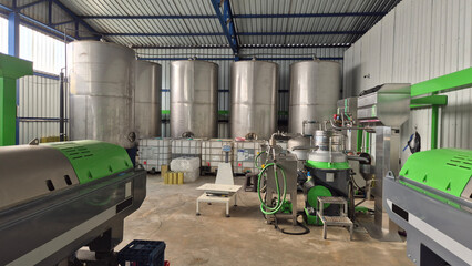 Olive Oil Processing Factory with Tanks and Machinery