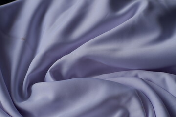 background Soft White Fabric with Elegant Creases and Subtle Shine