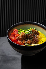 Poke bowl with chicken, tofu, yuuyama and vegetables isolated for menu