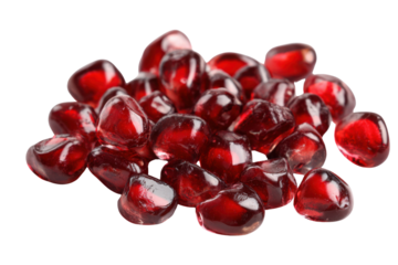 Jewel-toned Pomegranate Seeds: A close-up showcases a pile of glistening, ruby-red pomegranate seeds, each a tiny burst of flavor, offering a glimpse of the fruit's vibrant heart.