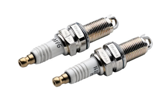 Spark Plug Close-Up: A detailed close-up of two spark plugs, showcasing their intricate design and precision engineering. A symbol of mechanical ingenuity.
