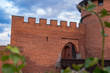 Red brick Gothic fortifications at Malbork Castle, Poland © Earthly Shots