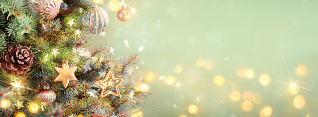 Christmas Ornaments On Tree - Lights Glowing In Fir Branches With Pine Cone And Green Abstract Background
