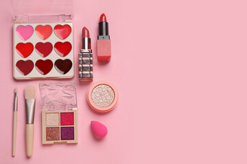 Set of cosmetic products on pink background. Top view
