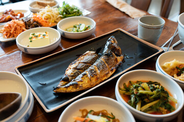 Korean Traditional Table Setting (Baekban) with Grilled Mackerel Fish