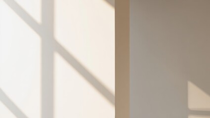 Fototapeta premium Sunlight casting strong geometric shadows from a window frame onto a smooth, warm beige interior wall surface, creating an abstract and minimalist background