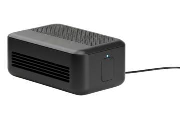 Small portable black car air purifier with blue LED light on a transparent background