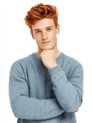 headshot of red haired serious young male blogger looks confidently at camera thinks about new content of his web page dressed casually earns money distantly isolated over white background no logos n